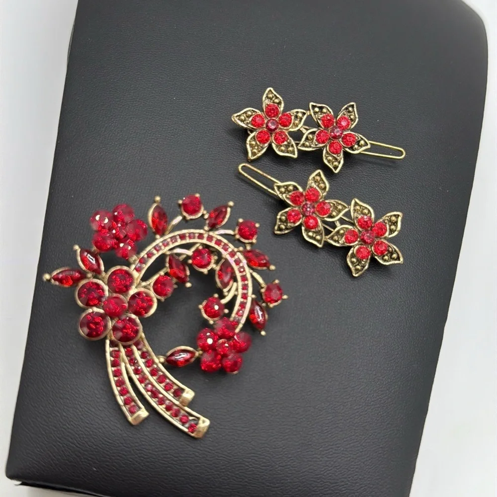 Beautiful red rhinestone statement brooch and complimentary hair barrettes
